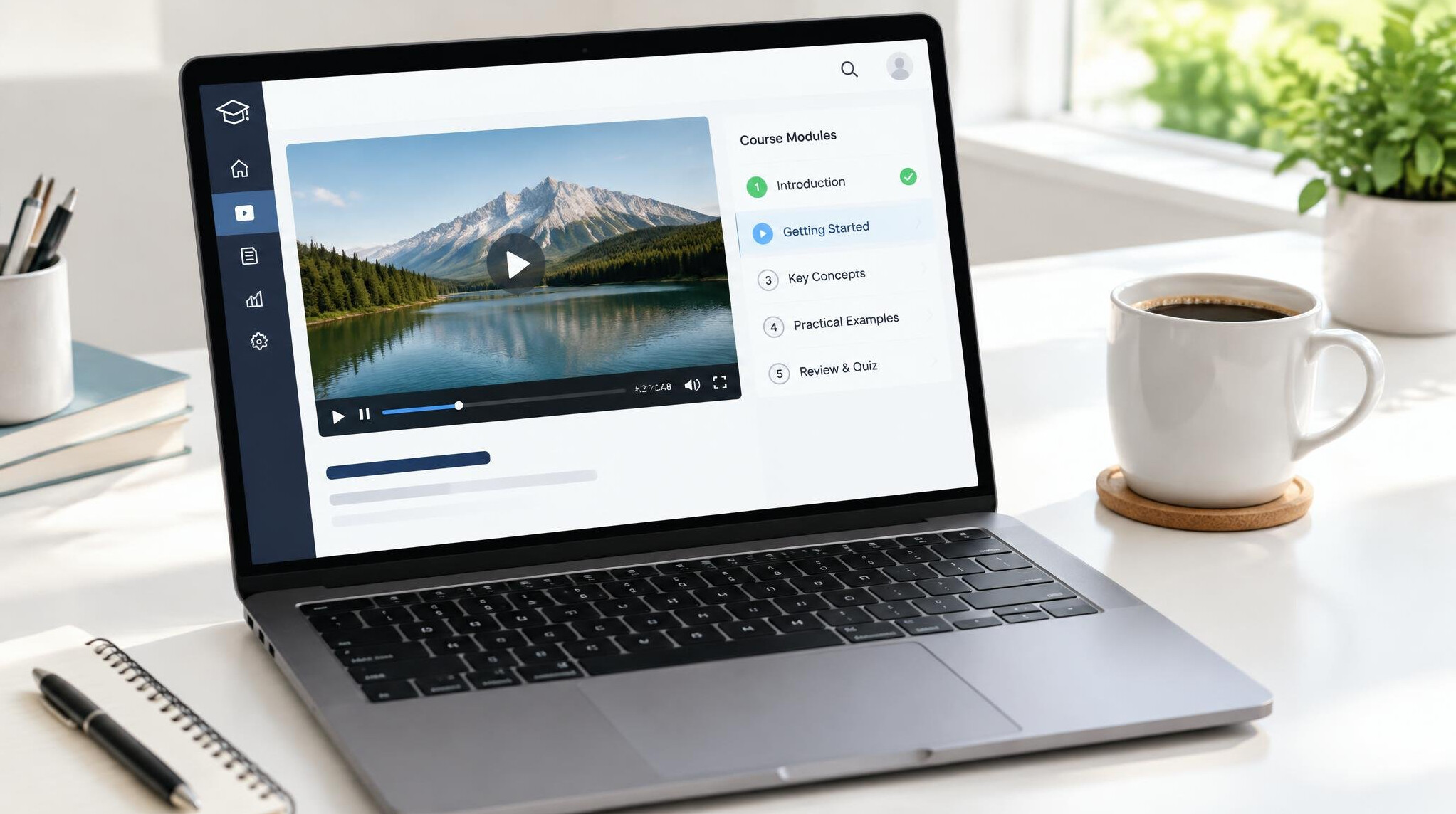 Laptop showing an online video lesson with course modules list